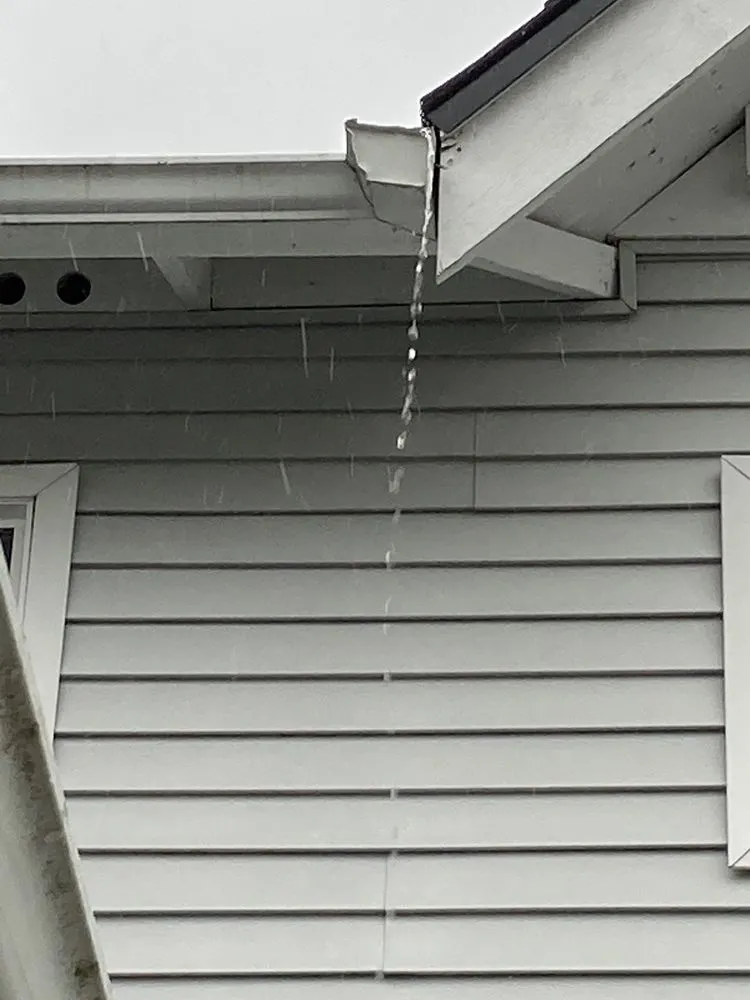 Slide of Phil and Sons Roofing