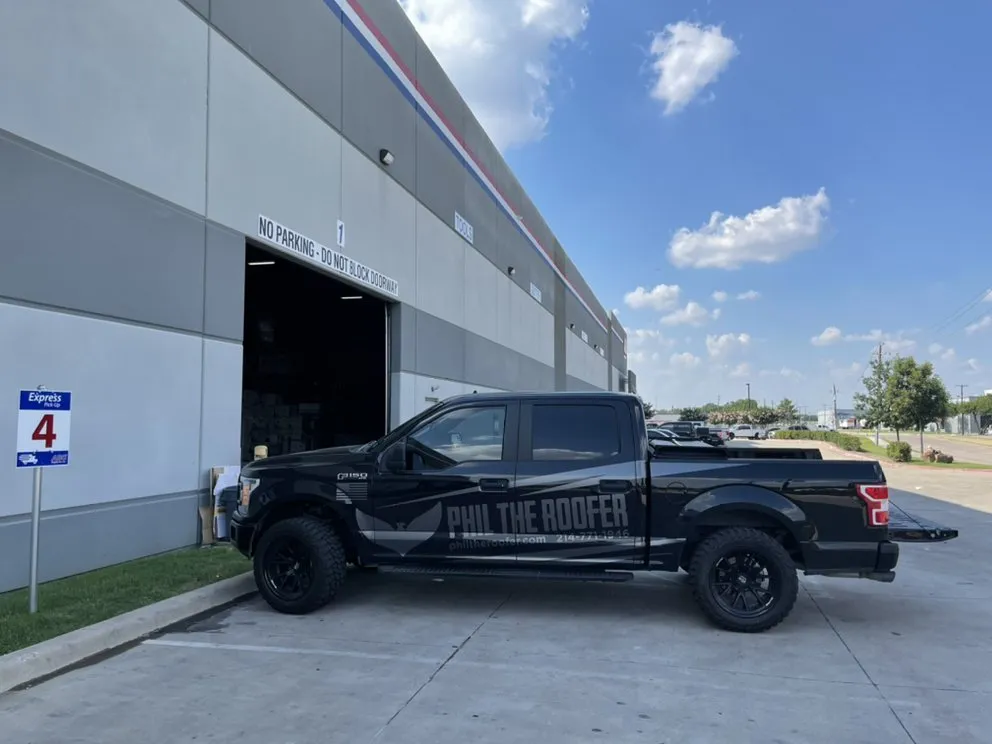 Slide of Phil The Roofer