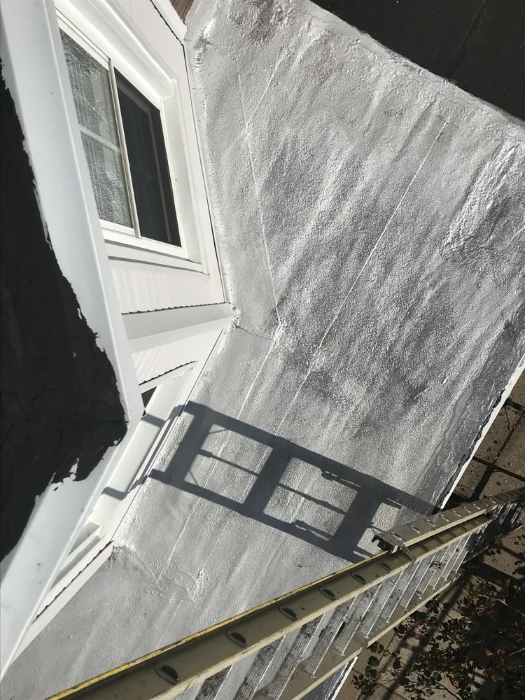 Slide of Philly's Phinest Roofing