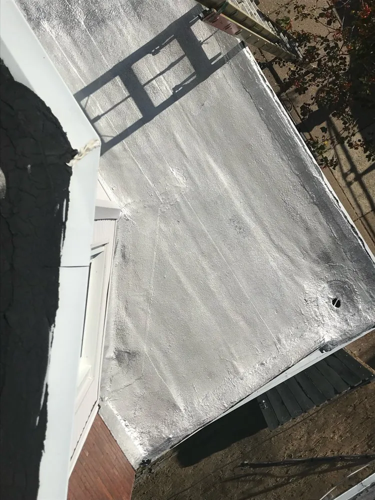 Slide of Philly's Phinest Roofing