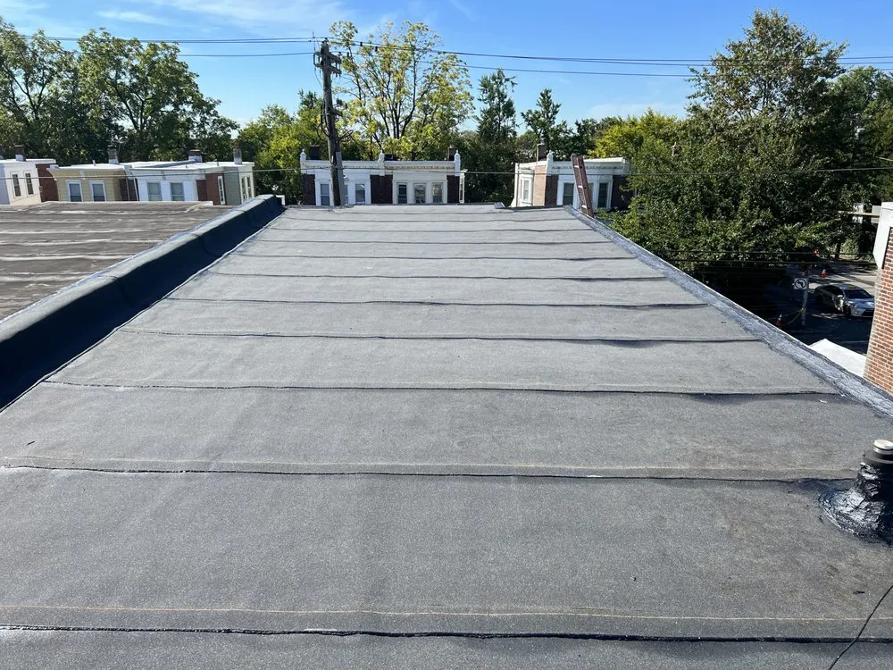 Slide of Philly's Phinest Roofing