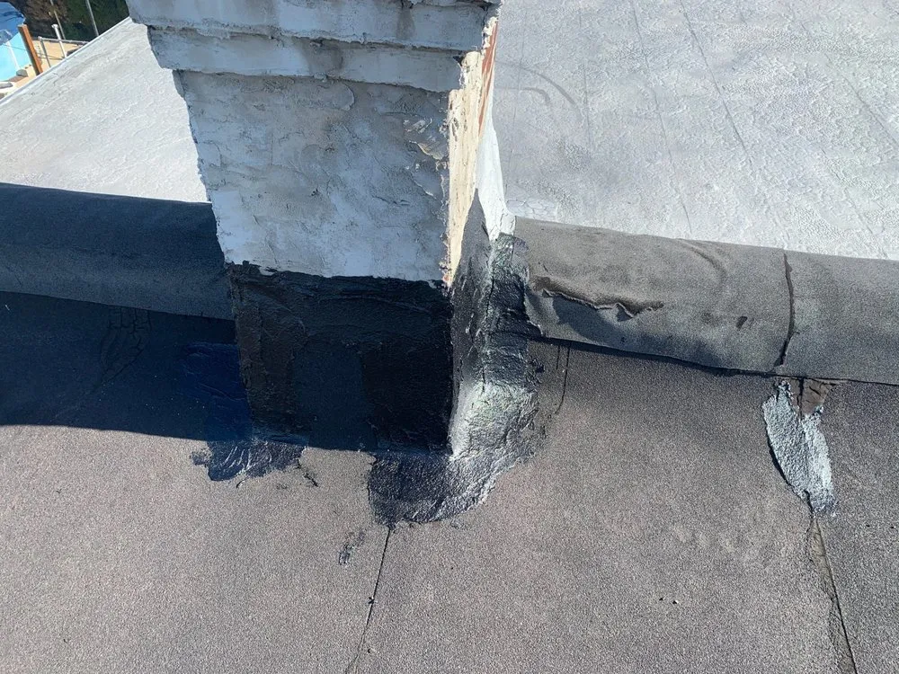 Slide of Philly's Phinest Roofing