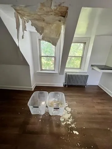 Slide of Philly's Phinest Roofing