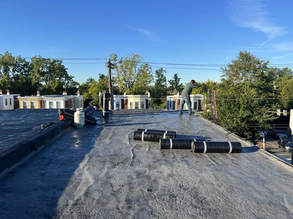 Slide of Philly's Phinest Roofing