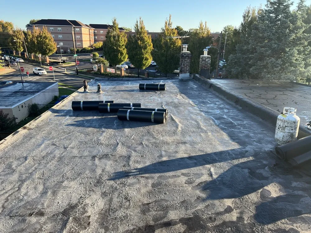 Slide of Philly's Phinest Roofing