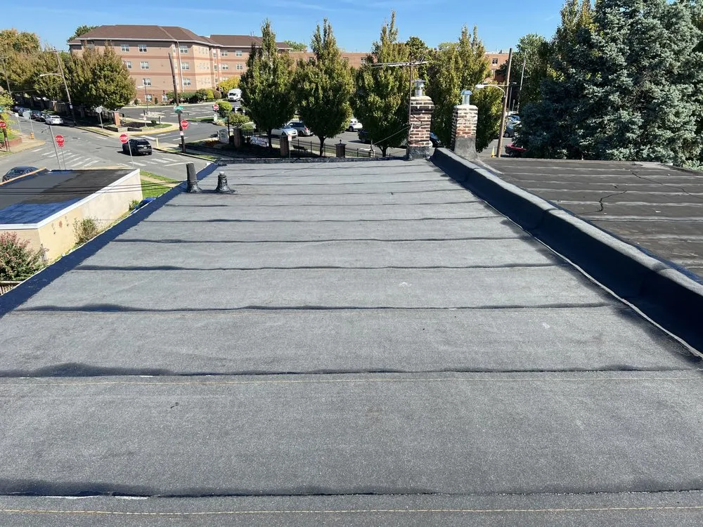 Slide of Philly's Phinest Roofing