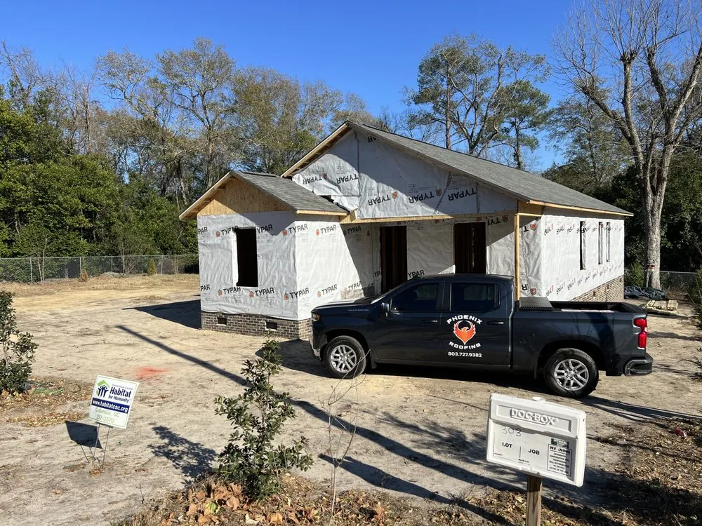 Slide of Phoenix Roofing