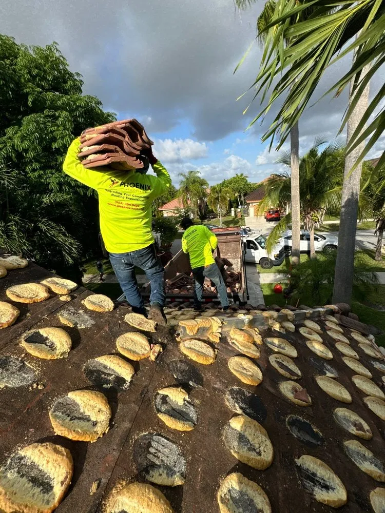 Slide of Phoenix Roofing Group