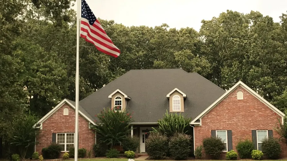 Slide of P.I. Roofing