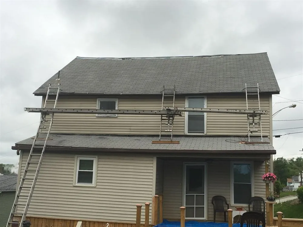 Slide of Pindro Roofing Company