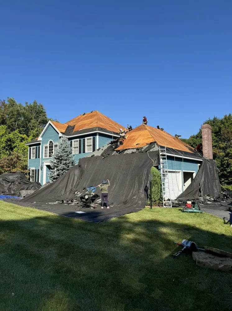 Slide of Pinkman Roofing