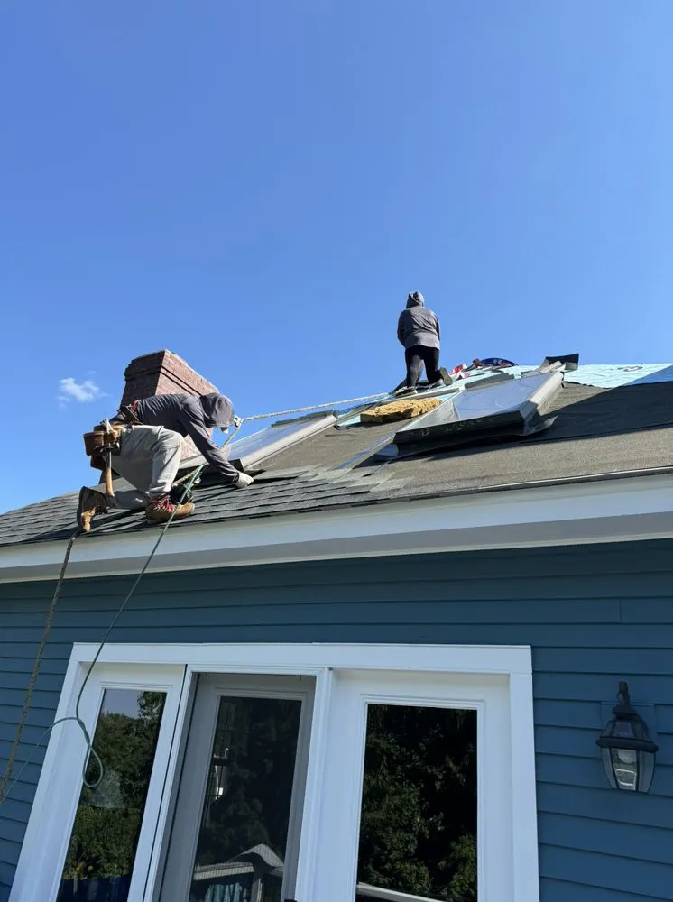 Slide of Pinkman Roofing