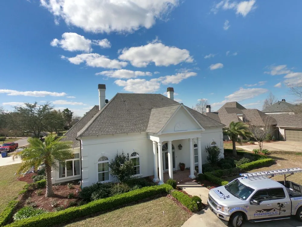 Slide of Pinnacle Exteriors Roofing