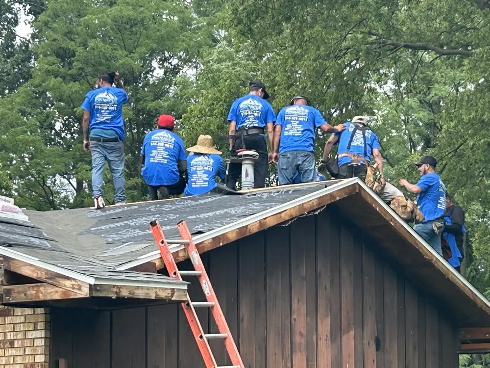 Slide of Pinnacle Roofing & Construction