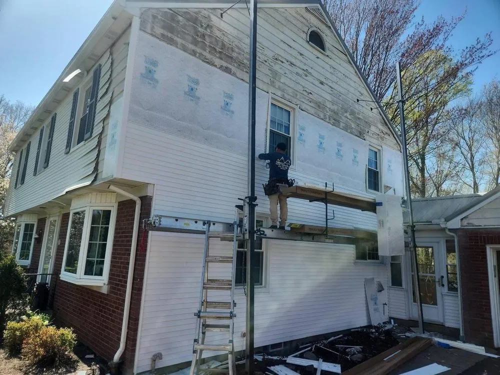 Slide of Pinnacle Roofing & Construction