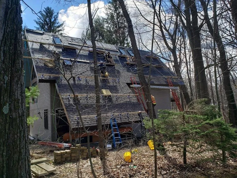 Slide of Pinnacle Roofing & Construction