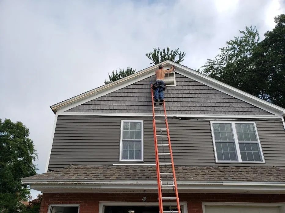 Slide of Pinnacle Roofing & Construction