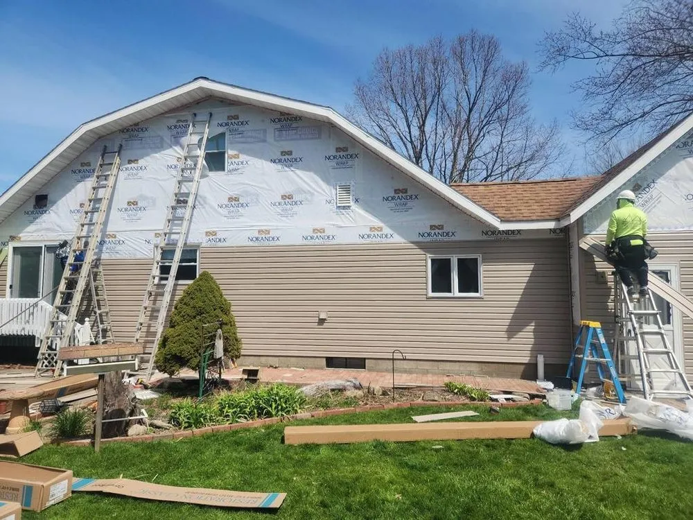 Slide of Pinnacle Roofing & Construction