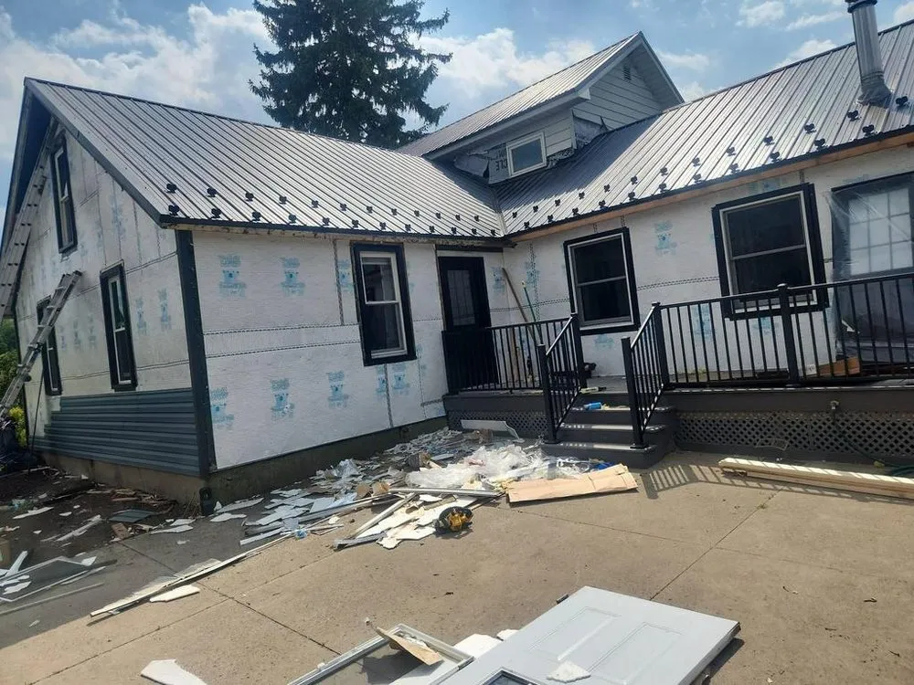 Slide of Pinnacle Roofing & Construction