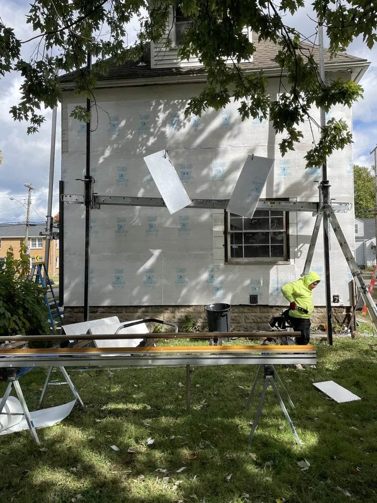 Slide of Pinnacle Roofing & Construction