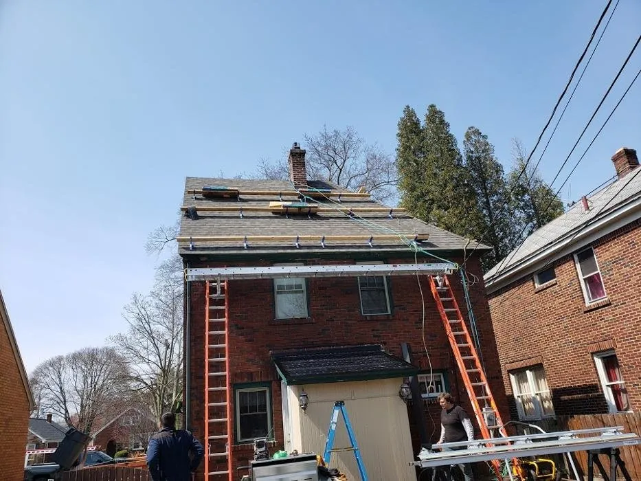 Slide of Pinnacle Roofing & Construction