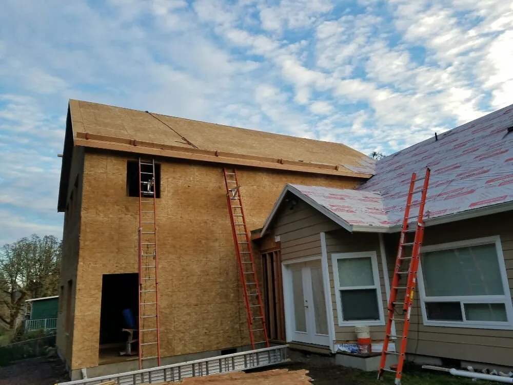 Slide of Pinnacle Roofing & Construction