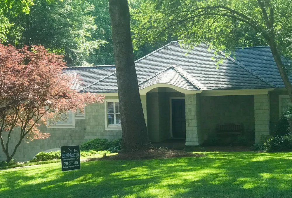 Slide of Pinnacle Roofing & Exteriors