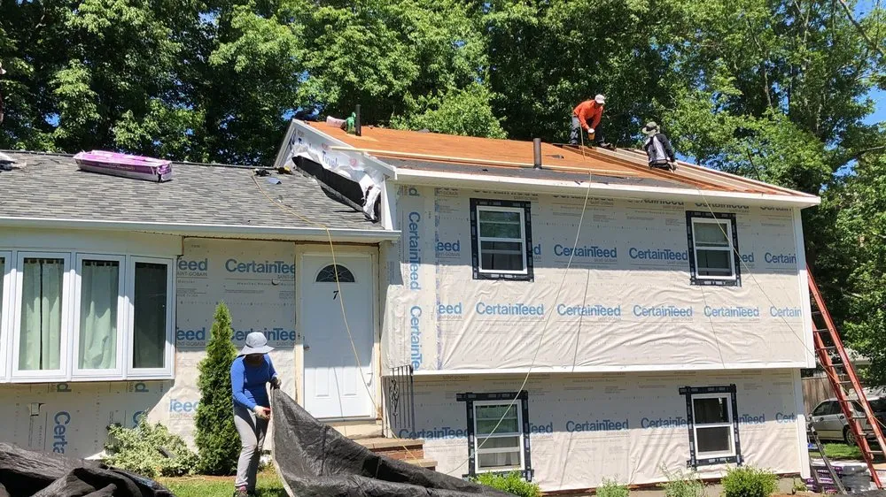 Slide of Pinnacle Roofing