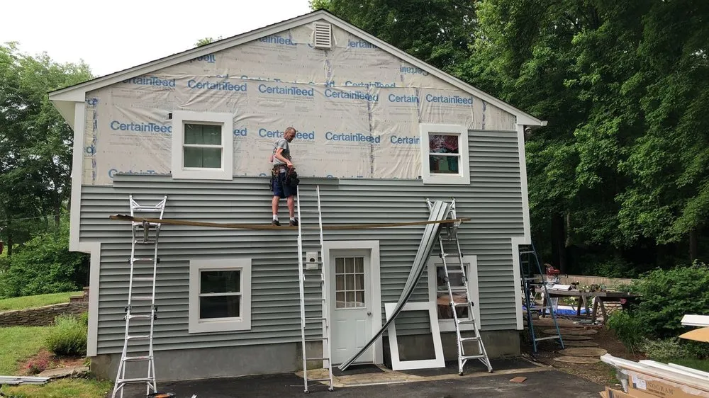 Slide of Pinnacle Roofing