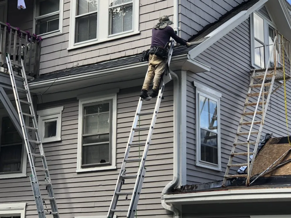 Slide of Pinnacle Roofing