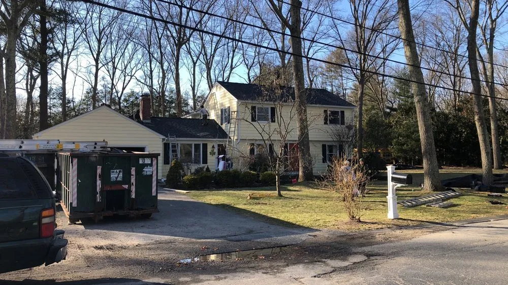 Slide of Pinnacle Roofing