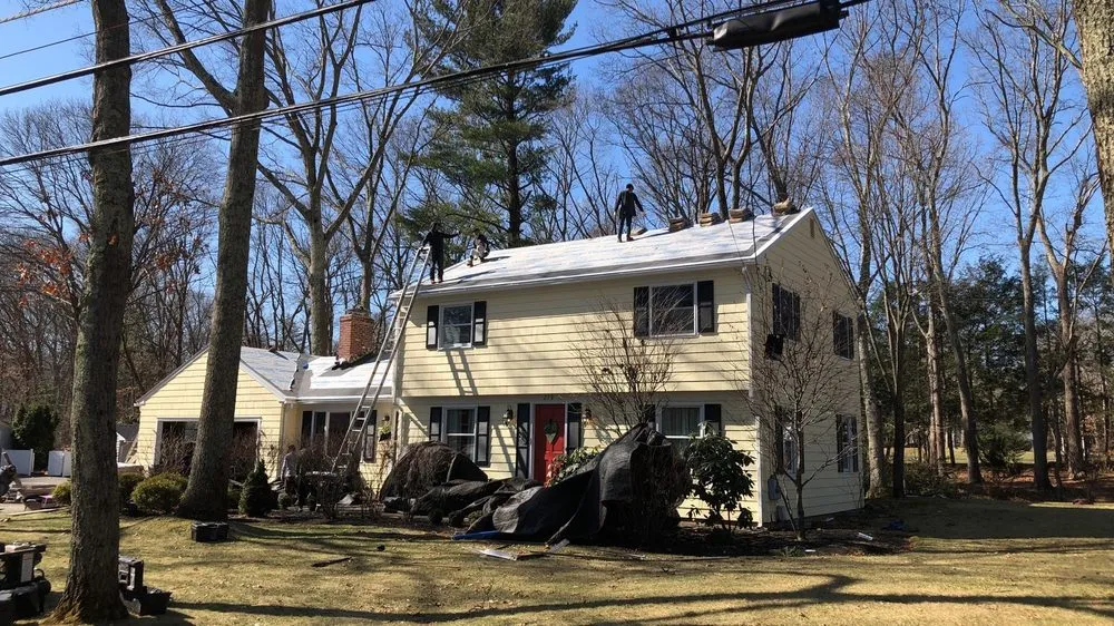 Slide of Pinnacle Roofing