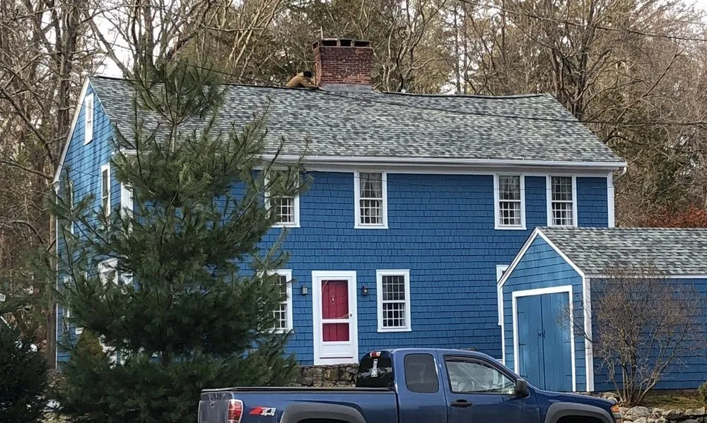 Slide of Pinnacle Roofing