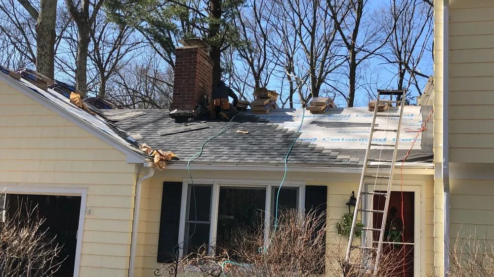 Slide of Pinnacle Roofing