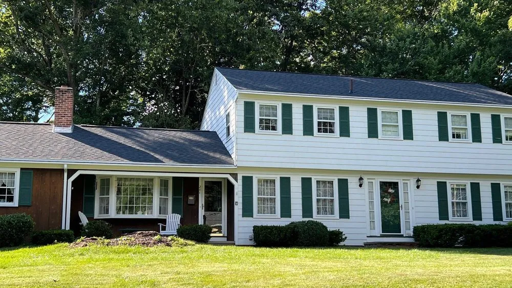 Slide of Pinnacle Roofing