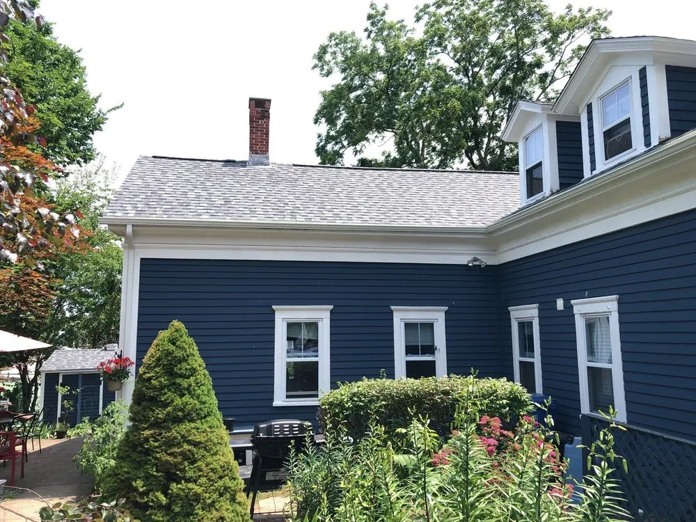 Slide of Pinnacle Roofing