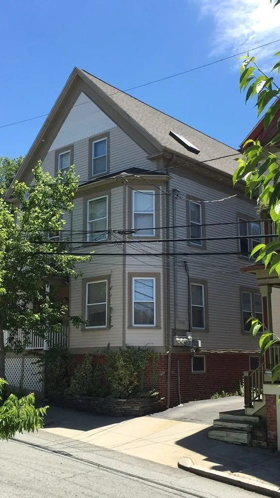 Slide of Pinnacle Roofing of Providence