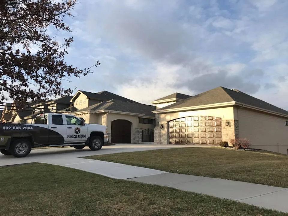 Slide of Pinnacle Roofing