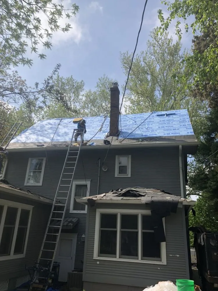 Slide of Pinnacle Roofing