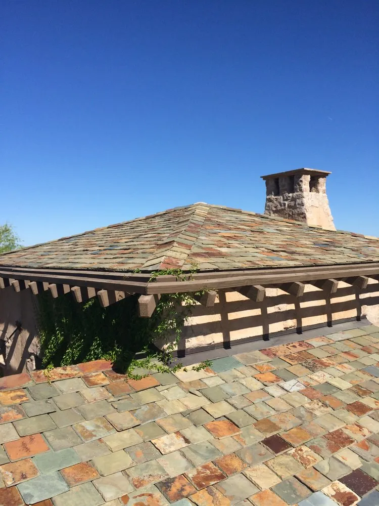 Slide of Pinnacle Roofing