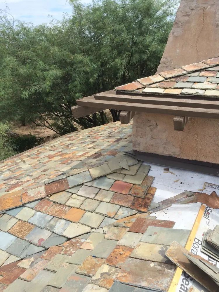 Slide of Pinnacle Roofing