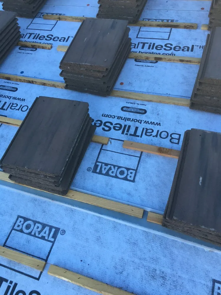 Slide of Pinnacle Roofing