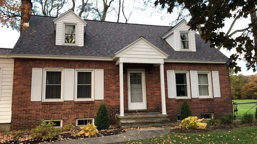 Slide of Pinnacle Roofing