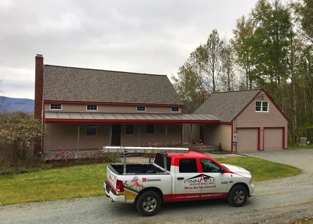 Slide of Pinnacle Roofing