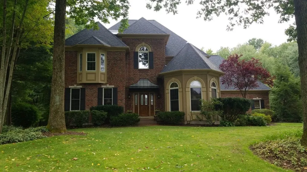 Slide of Pinnacle Roofing