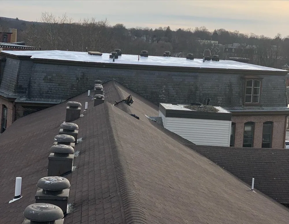 Slide of Pinnacle Roofing Services