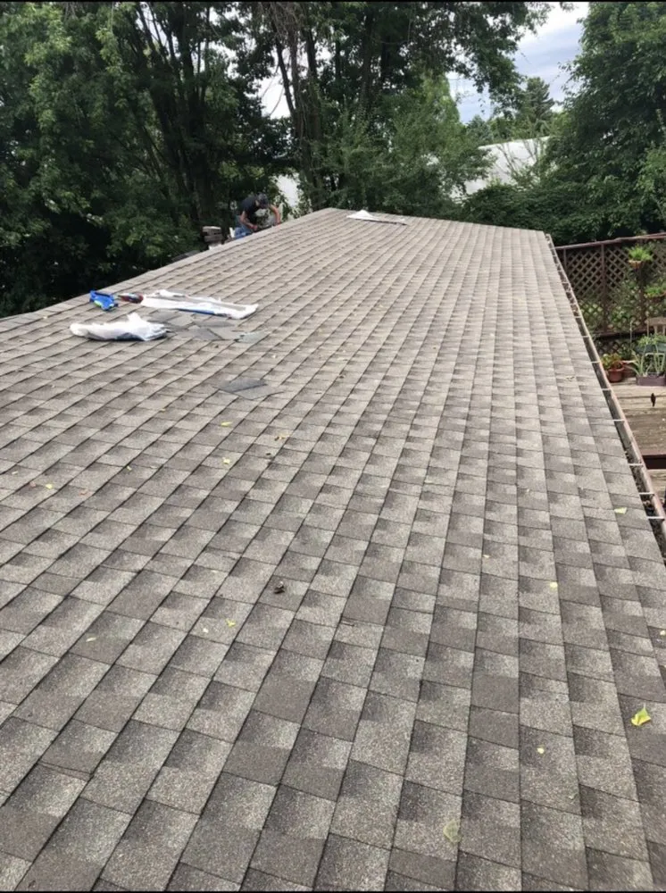 Slide of Pinnacle Roofing Services