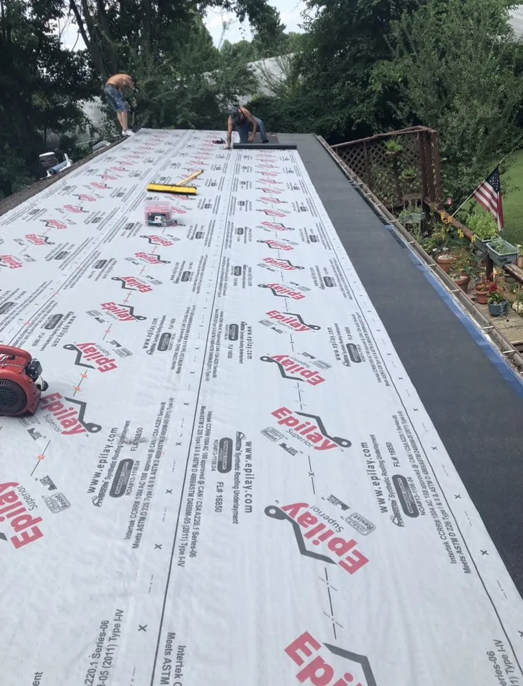 Slide of Pinnacle Roofing Services