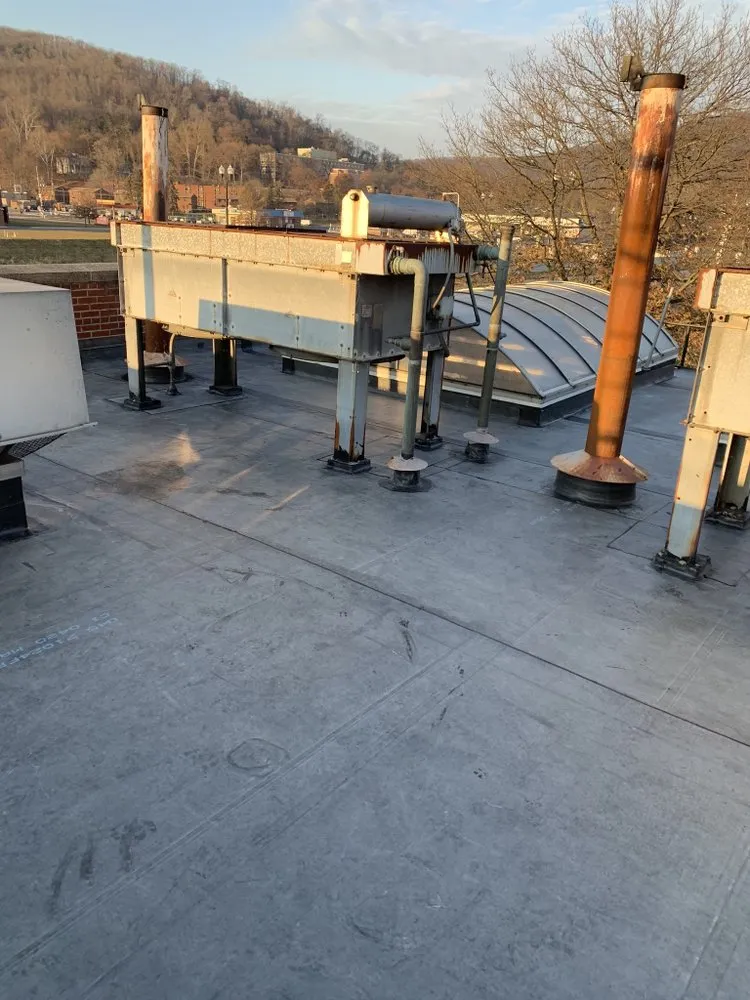 Slide of Pinnacle Roofing Services