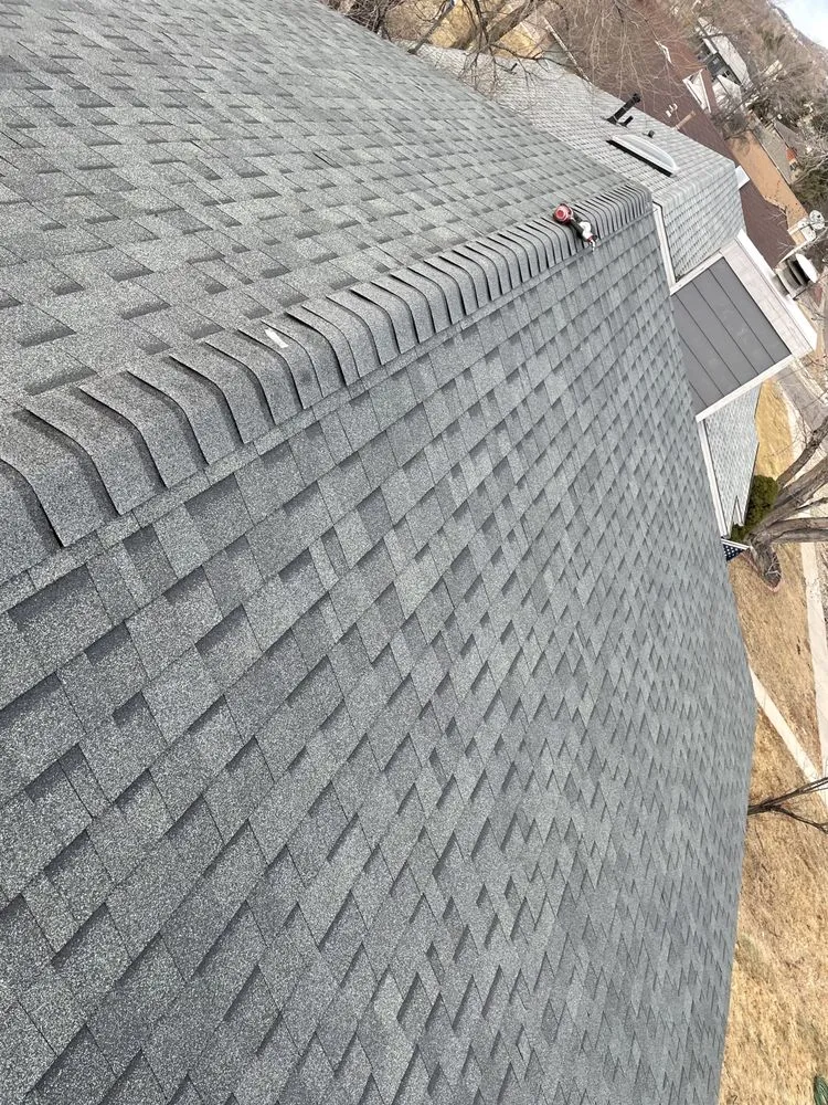 Slide of Pintos Roofing and Exterior’s